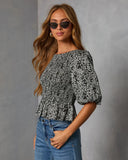 Crestal Puff Sleeve Peplum Top