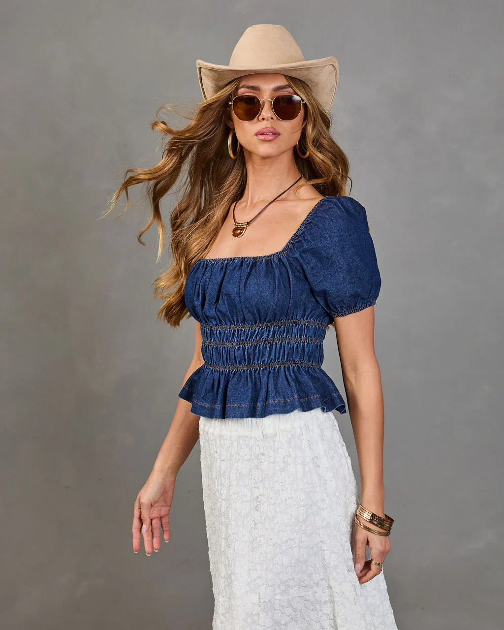Navelle Smocked Denim Peplum Top